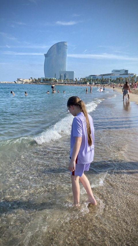 Rick's daughter paddling in the Mediterranean at Barceloneta